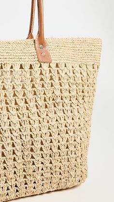 Spring Beige Crochet Bag With Woven Leather, Summer Cream Straw Bag With Woven Leather, Beach Tote Bag With Leather Trim, Summer Travel Shoulder Bag With Snap Closure, Natural Straw Bag With Leather Trim, Summer Beige Crochet Bag With Leather Handles, Spring Travel Crochet Bag With Leather Handles, Summer Cream Shoulder Bag With Woven Leather, Beige Woven Leather Beach Bag