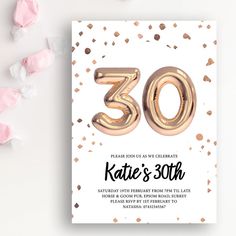 a 30th birthday party card with gold foil balloons and confetti scattered around it