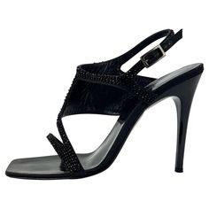 Check out this item from 1stdibs! Early 2000s Gucci Tom Ford Black Beaded Strap Heels Size 38C: https://www.1stdibs.com/id-v_15862612 Gucci Open Heel Sandals For Evening, Luxury Gucci Evening Sandals, Elegant Gucci Sandals For Evening, Glamorous Gucci Evening Sandals, Gucci High Heel Sandals For Evening, Gucci Open Toe Evening Sandals, Glamorous Gucci Ankle Strap Heels, Gucci Heels With Heel Strap For Evening, Gucci Glamorous Evening Heels