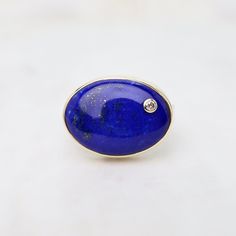 RNG-14K Sterling & 14K Gold Ring with Oval Smooth Lapis & Diamond Modern Oval Cabochon Sapphire Ring, Modern Sapphire Ring With Oval Cabochon, Modern Oval Gemstones As Gift, Oval Yellow Gold Rings With Stones, Modern Oval Cabochon Jewelry With Large Stone, Modern Oval Gemstones With Polished Finish, Modern Oval Stone Jewelry, Modern Jewelry With Large Oval Stone, Modern Oval Opal Ring With Bezel Setting