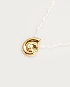 Materials: 18k gold plated brass, cord Measurements: 440mm/17.32" in length, 70mm/2.75" in extension length En Route Jewelry, Nautilus Shell, Tokio Hotel, Cord Necklace, Nautilus, 18k Gold, Shells, Gold Plate, Plating