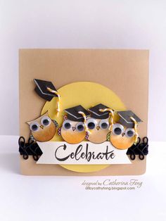 a card with three owls wearing graduation caps and the words celebrate on it's front