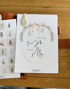 the wedding stationery is laid out and ready to be used as guest's book