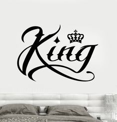 a wall decal with the word king and a crown on it's head