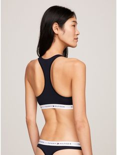 Tommy Hilfiger women's underwear. Presenting our bralette in lightweight and breathable stretch cotton for an assured, comfortable fit.  Material: 95% Regenerative Cotton, 5% Elastane. Fitted Cotton Sports Bra With Seamless Construction, Cropped Sports Bra With Medium Support, Seamless Fitted Cotton Sports Bra, Fitted Cotton Seamless Sports Bra, Fitted Seamless Cotton Sports Bra, Fitted Cotton Sports Bra With Light Support, Seamless Cotton Sports Bra With Medium Support, Medium Support Cotton Crop Top, Stretch Bra With Moderate Coverage