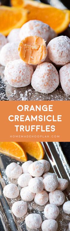 orange creamsice truffles on a tray with an orange slice in the background