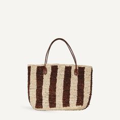 A woven raffia shoulder bag with an organic stripe print. Wear it as a small beach tote, or day or evening bag. Features two smooth leather shoulder straps and an interior leather bottom panel to keep the bag's structure. Striped Top Handle Bag For Everyday Use, Striped Top Handle Bag For Shopping, Everyday Striped Bags With Leather Handles, Casual Striped Rectangular Straw Bag, Striped Rectangular Bag With Leather Handles, Striped Woven Rectangular Straw Bag, Casual Striped Woven Straw Bag, Striped Woven Rectangular Shoulder Bag, Rectangular Striped Woven Straw Bag