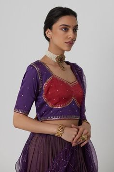 Deep purple tissue chanderi lehenga with all over gullista bloom aari-zardozi embroidered highlights. Paired with a half sleeves embroidered purple-pink choli cut blouse and bloom pattern mukaish organza dupatta. - Aza Fashions Anarkali Tops With Dupatta For Wedding, Silk Dupatta Top For Wedding, Silk Top With Dupatta For Wedding, Wedding Tops With Dupatta For Navratri, Silk Wedding Top With Dupatta, Wedding Tops With Dupatta For Diwali, Wedding Tops With Dupatta For Eid, Chanderi Sets With Motifs For Reception, Festive Purple Sharara With Motifs