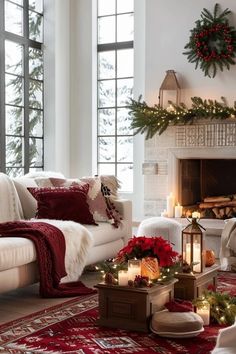 a living room decorated for christmas with red and white decor