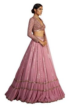 Dull pink tiered lehenga with sequin striped hand embroidery. Paired with sequin embroidered blouse and mirror work dupatta.
Component: 3
Embroidered
Neckline: V neck
Sleeve Length: Full
Fabric: Georgette, Net 
Color: Pink
Mirror and sequin work
Sheer dupatta
Scallop neckline
Closure:
Blouse: Back zip - Aza Fashions Blouse With Full Sleeves, Vani Vats, Lehenga Dupatta, Organza Lehenga, Organza Blouse, Traditional Indian Dress, Georgette Dupatta, Georgette Blouse, Black Saree