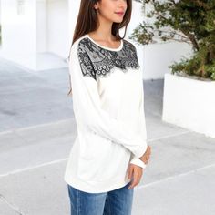 The Anna-Kaci Women's Long Sleeve Top with Lace Yoke Detail and Relaxed Fit is a charming and versatile addition to your wardrobe. Crafted from soft, breathable fabric, this top features an intricate lace yoke that adds a touch of elegance and femininity to the design. The relaxed fit ensures all-day comfort, making it perfect for casual outings, work, or weekend wear. With its long sleeves and delicate lace detailing, this top pairs beautifully with jeans, skirts, or trousers for a chic, effort Spring White Tops With Contrast Lace, Spring White Top With Contrast Lace, White Tops With Contrast Lace For Spring, White Lace Contrast Tops For Spring, Casual Fall Lace Patchwork Top, Casual Long Sleeve Lace Trim Top, Casual White Lace Patchwork Top, Casual White Top With Lace Patchwork, Casual White Tops With Lace Patchwork