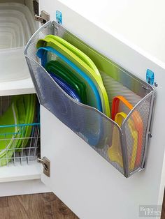 an image of a drawer full of dishes and utensils on the appliance