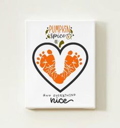 a white square tile with an image of two feet in the shape of a heart that says pumpkin spice and everything nice