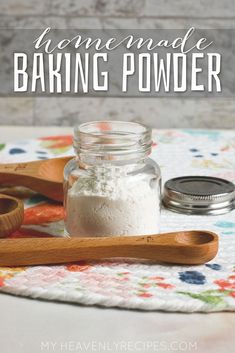 homemade baking powder in a glass jar with wooden spoons