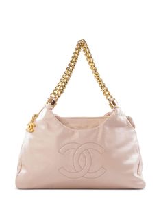 circa 2009 light pink satin logo charm signature stitched interlocking CC logo two chain-link shoulder straps partitioned compartment zip-fastening compartment Condition: GOOD. This previously owned and used item is in good condition with minimal signs of use. This may include fading of material or plating and scratches. Purchasing this item continues its narrative and reduces the environmental impact by avoiding the use of new resources needed to make the product from scratch, such as water, ma Pink Vintage Bag, Vintage Makeup Products, Light Pink Bag, Pink Chanel Bag, Vintage Chanel Bag, Pink Bags, Shoulder Bag Pink, Chanel Logo, Pink Chanel