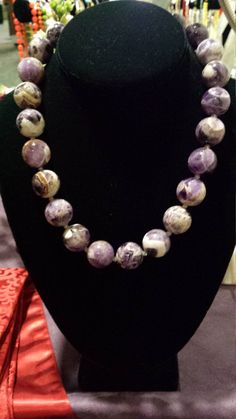 "Large beaded, penny size, amythyst necklace. Smooth polished stones, with lots of color variations. Necklace is 18\" long. This wonderful piece looks great with any outfit." Luxury Artisan Beaded Necklaces With Round Beads, Purple Crystal Necklace With Faceted Beads, Handmade Round Amethyst Beaded Necklaces, Purple Faceted Beads Round Beaded Necklace, Purple Round Beaded Necklace With Faceted Beads, Purple Beaded Necklace With Faceted Beads, Purple Gemstone Beaded Necklaces, Beautiful Beaded Necklaces, Creative Necklace