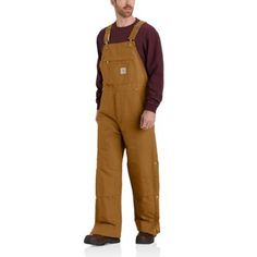 Built to take on the elements, these men's bib overalls are water-repellent, wind-resistant, and insulated. Made from Carhartt's strongest cotton duck with a double layer at the knees and reinforced kick panels. Built with ankle-to-thigh zips and all the pockets you could want. 12-ounce, firm-hand, 100% ring-spun cotton duck Nylon lining quilted to midweight polyester insulation Adjustable front-elastic suspenders Multi-compartment bib pocket with zipper closure Zipper Fly Two large lower-front Carhartt Bibs, Coveralls Mens, Work Overalls, Western Boots For Men, Mens Overalls, Men Carhartt, Safety Clothing, Work Boots Men, Bib Overalls