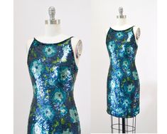 "Awesome 90s 00s Party dress!! * Sequin metallic body fully embellished with blue green sequins in floral pattern * Fit body to show off your curves * back zip closure  * Fully lined  * Great Vintage Condition * Stunning show stopper!! By Adrianna Papell Size 4 fits like a XS Small Era 90s Measurements:  Bust 33\" Waist 27\" Hip 36\" Length 35\" All measurements are given in full.  Visit the shop  https://www.etsy.com/shop/Hookedonhoney ** twitter | hookedonhoney ** pinterest | hookedonhoney ** Instagram | hookedonhoneyvintage" Blue Fitted Sequin Dress For Summer, Fitted Blue Sequin Summer Dress, Fitted Blue Sequin Dress For Summer, Fitted Blue Sequin Dress For Spring, 90s 00s Party, 00s Party, Perfect Birthday Dress, Sequin Party, Party Clothes