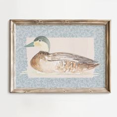 a watercolor painting of a duck sitting on top of a blue and white wall