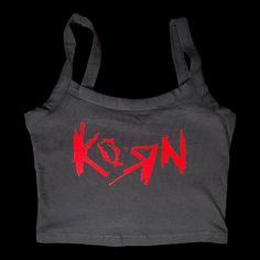 IMPORTANT: Sizes XS-S will come on Bella+Canvas blanks [please see last two photos for example of tank top and size chart]. Thanks for your understanding! Slim Fit Cropped Cami Tank Top - KoRn Made from recycled cotton and spandex, these crop tops are super soft and stretchy, perfect for the heaviest metal festival, a romp through the forest, or simply relaxing in your lair. Each top is uniquely printed just for you, which not only assures you have a one-of-a-kind piece of metal flair, but also Fitted Racerback Top For Streetwear, Fitted Tank Top For Concerts, Casual Tank Strap Tops For Streetwear, Casual Streetwear Tops With Tank Straps, Urban Style Summer Tops For Concerts, Cotton Crop Top For Concert, Black Cotton Crop Top For Concert, Fitted Grunge Tank Top For Concert, Punk Style Cotton Tank Top For Concerts