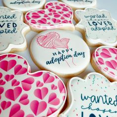 decorated cookies with happy valentine's day messages are arranged in the shape of hearts