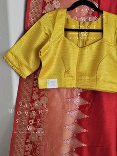 Blouse stitched - Yes Blouse Opening - Back Sleeves Length - Elbow Padded - No Blouse size 38 with inner margins extends to 44 for blouse size 36 alteration can be done on request Fall/pico - Yes done Raw Silk Tops With Traditional Drape, Elegant Cotton Silk Blouse For Traditional Occasions, Elegant Red Cotton Silk Blouse, Yellow Art Silk Blouse With Zari Weaving, Red Cotton Silk Blouse With Traditional Drape, Anarkali Blouse With Zari Weaving, Yellow Blouse With Zari Weaving For Navratri, Yellow Anarkali Blouse With Zari Weaving, Yellow Diwali Blouse With Zari Weaving