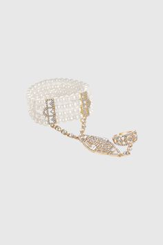 This sumptuous piece of jewelry features a retro-elegant yet slightly modern style that complements the lavish garments, reminiscent of the roaring 1920s. Features: Exquisite pearl decoration Inner perimeter of bracelet is 7.4"/ 18.8cm Diameter of ring: 0.7"/ 1.78cm Total length: 5.59"/ 14.20cm 1920 Accessories, Roaring 20s Jewelry, 20s Jewelry, Roaring 1920s, 1920s Jewelry, Pearl Decorations, Your 20s, Paisley Art, Roaring 20s