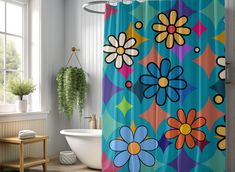 a colorful shower curtain with flowers painted on it