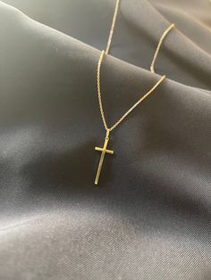 Wear your faith with this elegant cross necklace in a cable chain. - chain available in 16, 18, and 20 inches. Chain length can be customized. - approx. cross size : 10x26mm - 14K solid yellow gold Sustainably handmade in Los Angeles 14k Gold Cross Necklace With Adjustable Chain, Minimalist Cross Necklace With Delicate Chain Crucifix, Minimalist Crucifix Cross Necklace With Delicate Chain, Everyday Classic Cross Pendant Necklace, Classic Everyday Cross Pendant Necklace, Minimalist Tarnish Resistant Yellow Gold Cross Necklace, Minimalist Tarnish-resistant Yellow Gold Cross Necklace, Classic Everyday Cross Necklace, Minimalist 14k Gold Cross Necklace With Delicate Chain