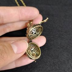 For More Similar Collection Check Out ! https://www.etsy.com/in-en/shop/CRAFTSHOPPYCo?ref=shop-header-name&listing_id=1471151035&from_page=listing&section_id=42071161 Vintage Brass Hollow Ball Locket Pendant Perfume Aromatherapy Essential Oil Diffuser DIY Necklace Keychain Ornaments Accessories For Craft. Diameter: 2cm Metals Type - Copper,Copper Alloy,Brass Material-100% Brass Use- Keychain, Locket , Pendant , Ball Decorative Antique Gold Necklaces For Gifts, Decorative Antique Gold Necklace For Gift, Antique Gold Nickel-free Necklace Gift, Antique Gold Nickel-free Necklace For Gift, Metal Necklace For Gift, Decorative Metal Necklace As Gift, Decorative Metal Necklace For Gift, Vintage Locket Necklace With Detachable Pendant For Gift, Antique Gold Filigree Necklace For Gift