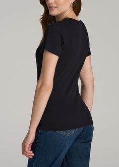 A Style Essential in Women's Tall T-Shirts The Perfect Fitting T-Shirt for Tall Women Our Short Sleeve Crew Neck Ribbed T-Shirt for tall women is a wardrobe essential for ladies over 5'9". With a focus on a snug fit and simple style, this top for tall women is designed to cater to your unique proportions and goes with nearly any outfit. It's more than just an average tee; it's a staple piece of clothing you'll wear again and again.• Fitted, hip-length design for a flattering look• Crewneck with Jeans For Tall Women, Women In Black, Tall Women, Perfect Woman, Staple Pieces, Fashion Essentials, Hip Length, Piece Of Clothing, Simple Style