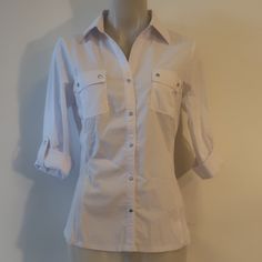 Nwt Womens Zac & Rachel White Button Down Blouse S* Chest Pockets Rolled Cuff Snap Sleeve Material: 68% Cotton 27% Polyester 5% Spandex Measurements (Flat): Length: 26" Sleeve: 14" Armpit: 19" Shoulder: 16" New With Tags....Ran_kat_uncle-1** Fitted Button-up Blouse With Roll-up Sleeves, Fitted Summer Tops With Roll-up Sleeves, Fitted Tops With Roll-up Sleeves For Summer, Elegant Fitted Top With Roll-up Sleeves, Summer Office Tops With Button Cuffs, Fitted Office Blouse With Snap Buttons, Fitted Tops With Roll-up Sleeves For Spring, Summer Office Wear Tops With Button Cuffs, Fitted Top With Roll-up Sleeves For Spring