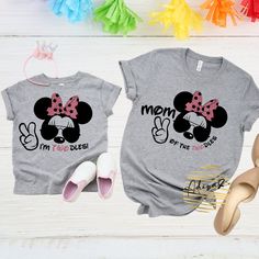 two shirts that say mom and daughter of the year with minnie mouse heads on them