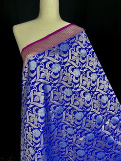 Beautiful Blue Color Dupatta with Gold and Sliver Zari Weaving. Dupatta has grand borders. Item: DupattaBase color : Blue Fabric : Banarasi Semi Soft Silk (Not Pure Silk)Work : Weaved with tasselsLength of the Dupatta : 92 inchesWidth of the dupatta : 36 inches Store Policies- No return or exchange will be accepted for color variations.- No return or exchange will be accepted if the color does not match your other clothing or your partners or anyone else.- Since this Dupatta is handmade hence li Benarasi Dupatta, Floral Dupatta, Vs Image, Men's Ethnic Wear, Bandhani Saree, Kanjivaram Sarees, Readymade Blouse, Silk Dupatta, Cotton Pyjamas