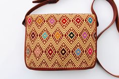 Beautiful embroidered Mexican Purses. It's one of a kind design and very versatile to use it every day. It's a great complement to wear with any outfits for any special occasion or everyday use. This lovely purse is embroidered on the front and the backside is plain. The Purse has 1 zippered compartment on top and a magnetic snap with a crossbody adjustable strap. It measures about 10x2x8″ inches. Find more colors and designs at https://www.etsy.com/shop/LatinxsCulturaViva?ref=simple-shop-header Mexican Purse, Mexican Bag, Embroidered Purse, Embroidered Bag, Gorgeous Bags, Super Sweet, Hand Embroidered, Shoulder Bags, Special Occasion