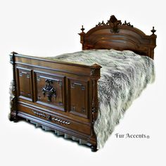 the bed is made with wood and fur