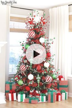 a christmas tree decorated with red, green and white ornaments