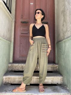 Crafted from high-quality, breathable cotton, our Bohemian Cotton Pants with Colorful Pockets offer the perfect blend of style and comfort. Designed for those who embrace a relaxed bohemian lifestyle, these elastic waist trousers feature a unique touch with colorful pockets, making them ideal for casual outings or lounging at home. Available in standard sizes S-L, they fit a variety of body types effortlessly. The versatile khaki tone adds a sophisticated touch to your wardrobe, while the relaxe Elastic Waist Trousers, Practical Fashion, Bohemian Lifestyle, Fitted Trousers, Style Expert, Cotton Pants, Halloween Shopping, Harem Pants, Bathing Beauties