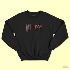 "Hellboy Goth Sweatshirt (Lil Peep Hoodie, Plus Size Goth, Goth Clothes, Lil Peep Sweatshirt, Emo Crewneck, Alt Clothing, Mall Goth) 💜 Hello there! Add some personality and style to your wardrobe with this \"Hellboy\" unisex goth sweatshirt, or give it as the perfect gift! A sturdy and warm sweatshirt bound to keep you warm in the colder months. A pre-shrunk, classic fit sweater that's made with air-jet spun yarn for a soft feel and reduced pilling. 📝 PRODUCT INFORMATIONS: * 50% cotton, 50% polyester * Pre-shrunk * Classic fit with no center crease * 1x1 athletic rib knit collar with spandex * Air-jet spun yarn with a soft feel and reduced pilling * Double-needle stitched collar, shoulders, armholes, cuffs, and hem" Emo Letter Print Sweatshirt For Streetwear, Winter Emo Crew Neck Sweatshirt, Halloween Punk Hoodie Tops, Punk Halloween Hoodie Top, Emo Crew Neck Sweatshirt For Streetwear, Alternative Halloween Hoodie Tops, Black Emo Sweatshirt With Letter Print, Winter Emo Sweatshirt With Letter Print, Emo Style Sweatshirt For Fall Alternative Fashion