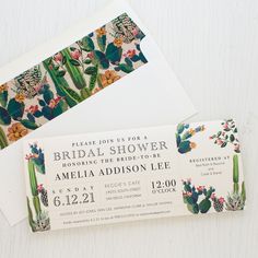 two tropical themed bridal shower tickets with pineapples, flowers and palm leaves