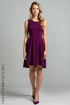 Olivia Mark - Elegant Plum Skater Dress with Sleeveless Design and Flared Silhouette Purple Sleeveless Feminine Dress, Purple A-line Fit And Flare Dress, Fit And Flare A-line Mini Dress With Flattering Silhouette, Fit And Flare A-line Mini Dress With Lace Trim, Purple Stretch Mini Dress Knee-length, Structured Design, Flared Skirt, Skater Dress, Flare Skirt