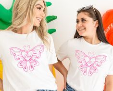 "Big Little Shirts Sorority Shirts Big Little Shirts Sorority Reveal Big Little Sorority Shirts Big Little Reveal Preppy Shirt Big Little Gifts Butterfly Shirt Big/Little Reveal QUICK  FACTS oBella Canvas 3001 Unisex T Shirt o100% Airlume combed and ringspun cotton  oLight Fabric. Retail fit. oTurn garment inside out. Wash and dry normally (on cool for best results). Do not dry clean. Do not iron. oActual product color may vary slightly from the listing photo due to monitor or mobile display. SIZING oAll items are unisex so runs like men's, although not overly large. oMost women find their typical size works best, since they are meant to fit a touch loose oSize guide and fit:  Size/Width/Length (inches) XS / 16.5\"/ 27\" S    /  18   / 28 M   /   20  / 29 L    /   22  / 30 XL  /  24   / 31 White Shirt With School Spirit For Spring, Pink Sorority T-shirt For Summer, Pink Sorority T-shirt For Spring, Spring Sorority Short Sleeve Tops, Pink Short Sleeve Sorority Tops, Sorority Short Sleeve Tops For Spring, Short Sleeve Sorority Tops For Spring, Sorority Style Short Sleeve Tops For Spring, Sorority Relaxed Fit Graphic Print Tops