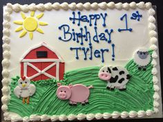 a birthday cake decorated with farm animals and the words happy 1st birthday tyler