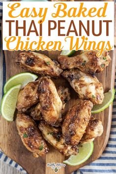 grilled chicken wings on a cutting board with limes