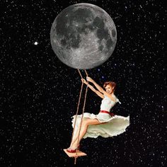 a woman on a swing with the moon in the background