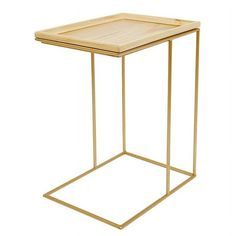 a gold metal and wood side table with a square tray on the top that is open