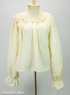 This long sleeved peasant blouse in ecru, has a gathered elastic neckline, raglan sleeve with an elastic ruffled cuff. Can be worn up or off the shoulder. Size Medium measures-38" bust, 18" length. Size Xlarge measures-42" bust,21" length. Poly-Cotton makes this machine washable, dry in a cool dryer.  *Note- this listing is for the blouse only. The vest shown in picture # 3 is sold separate. Please visit our store, and see the category "Corsets-Vests-Cinchers". Pirate- Renaissance 18th Century Pirate Clothing, Pirate Blouse, Pirate Dress, Peasant Shirt, Corset Vest, Retro Fashion Women, Pirate Shirts, Vintage Type, Peasant Style