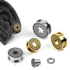 Gauge: 3/4" and #124; Color: Gold and #124; (pair). Sold as a pair. Featuring a Art Nouveau inspired design, these unique Spring Nimbus Eyelets make elegant adornments for your stretched lobes. Crafted from durable stainless steel, these plugs have a removable threaded flare to offer a secure fit. All measurements are approximate: 0g to 5/8" have a 7mm wearable area. 3/4" to 1" have a 7.3mm wearable area. The screw on backs are externally threaded and removable. Material(s): 316L Stainless Steel Silver Plug Earrings With Intricate Design, Single Hoop Metal Plug Earring, Silver Gold-plated Pierced Plug Earrings, Cool Plugs And Tunnels, Spiral Plugs Ear Gauges, Stretched Lobes, Looking For Something, New Jewelry, Spring Collection