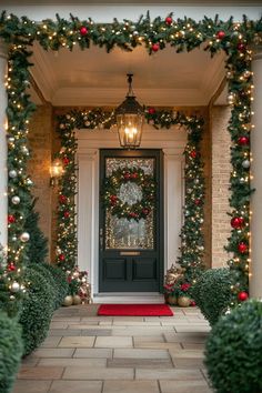 a front door decorated with christmas wreaths and lights