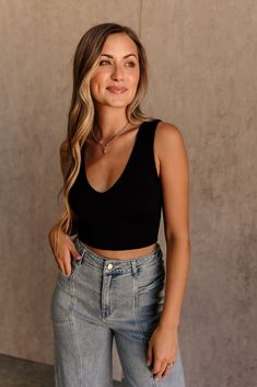 Elevate your essentials with our Must-Have Brami. This versatile piece features a flattering V neckline and a cropped waist, perfect for layering or wearing on its own. Crafted from ribbed stretchy fabric, it offers a comfortable and form-fitting design that hugs your curves in all the right places. With its one-size-fits-all construction, this Brami adapts to your unique shape, ensuring a perfect fit every time. Whether you're dressing up or down, this Brami is a stylish staple for any wardrobe Versatile Seamless Crop Top For Layering, Versatile Everyday Crop Top, Chic V-neck Seamless Crop Top, Versatile Seamless Crop Top, Chic Seamless Crop Top For Everyday, Chic Seamless Crop Top, Chic Seamless Everyday Crop Top, Black Seamless Crop Top For Layering, Chic Solid Color Crop Top For Layering